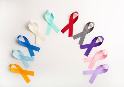 Semi-circle of colorful cancer awareness ribbons